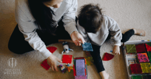 How to Reparent Yourself blog post photo of mother and child playing